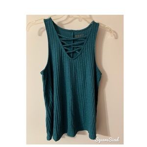 teal tank with caged front